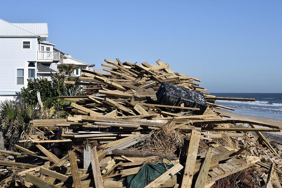 A pile of splintered lumber left behind by a hurricane